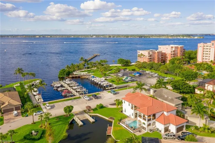 Bird's eye view of a marina and a nearby body of water