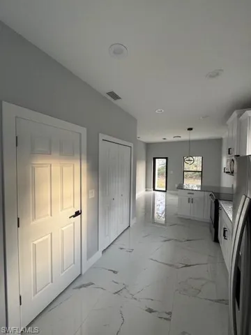 View of laundry room & Pantry room.