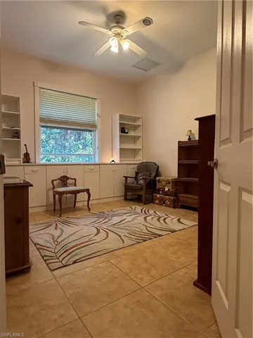 Entrance to property featuring a carport