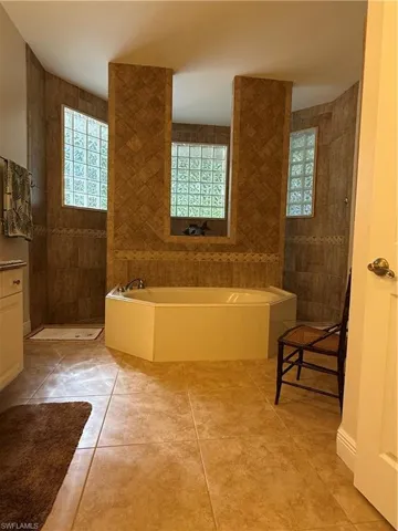 Bathroom with tiled shower