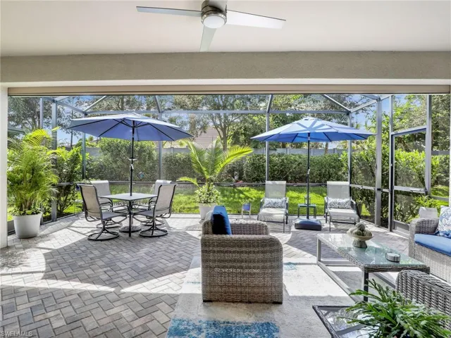 Amazing Florida setting with Extended Lanai with patio furniture included!