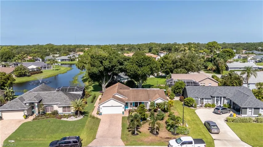 Aerial view of residential area with a large body of water