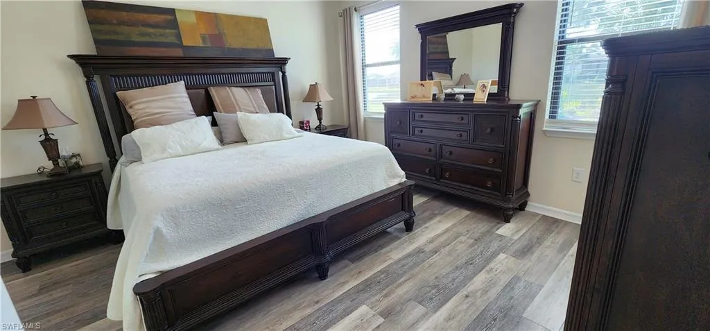Bedroom with light wood finished floors
