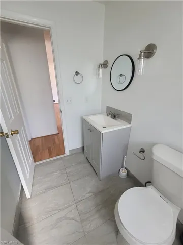 Bathroom with vanity and toilet