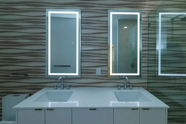 Exterior details with double vanity and a sink