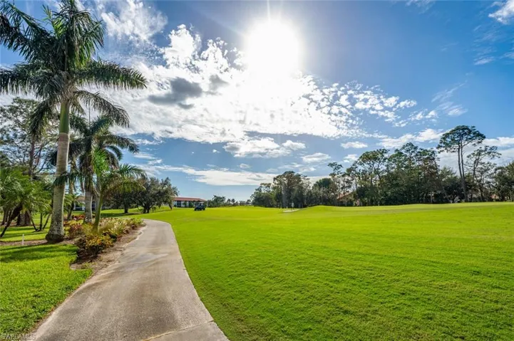 View of community with a yard