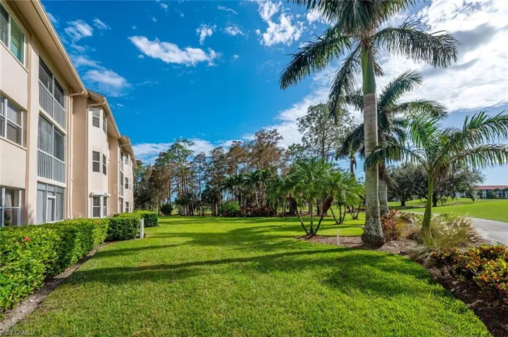 View of home's community featuring a lawn