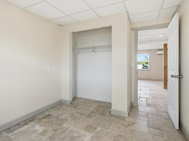 Closet with a wall mounted AC