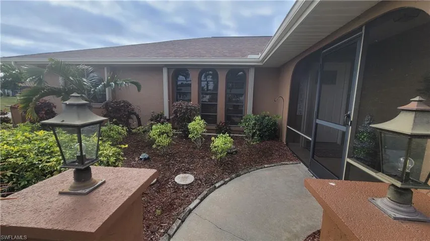 View of patio / terrace featuring a sunroom