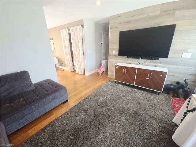 Living area featuring light wood-style floors