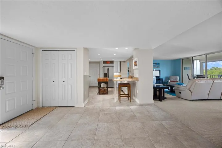 Living room with light colored carpet