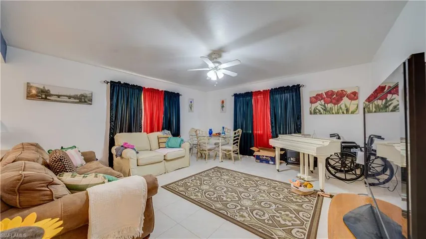 Tiled living area with ceiling fan