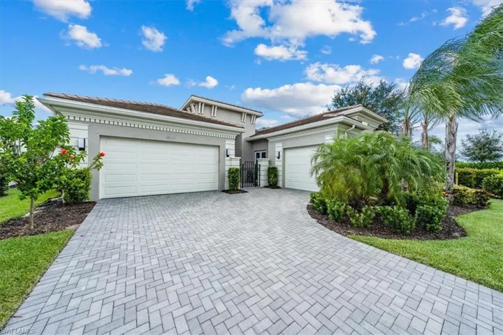 View of front of property featuring a garage