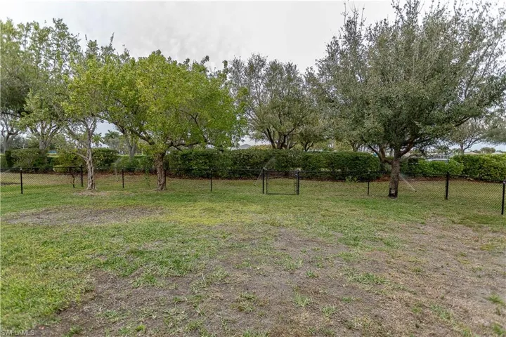 View of yard featuring a gate