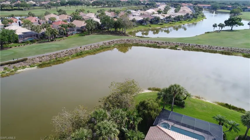 View of property's community with a lawn and a gazebo