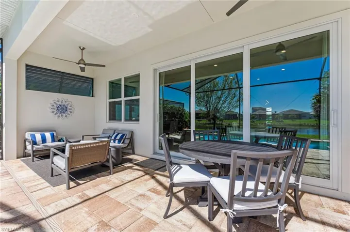 View of patio / terrace featuring an outdoor hangout area, outdoor dining area, and a ceiling fan