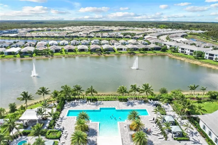Drone / aerial view featuring a residential view and a water view