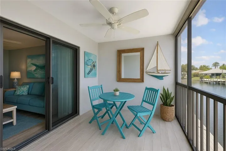2nd floor lanai with pool view; digitally staged