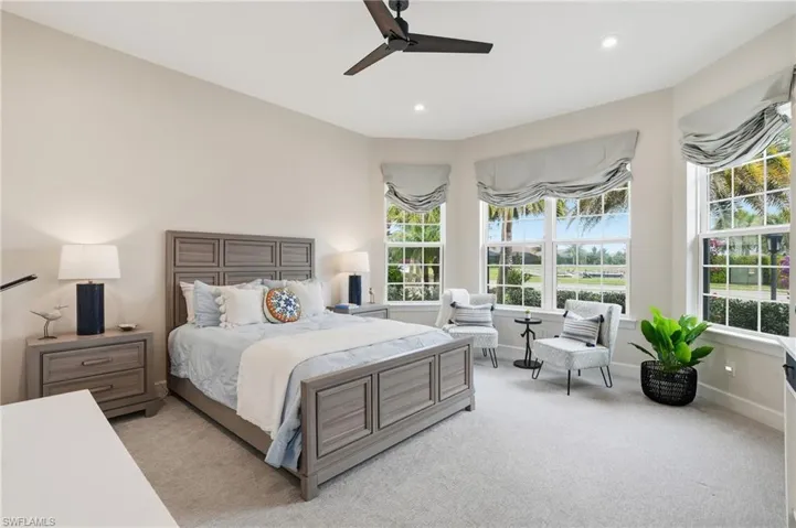 Bedroom with ceiling fan, carpet, and recessed lighting