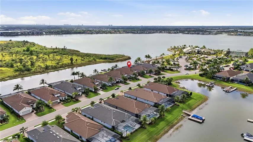 Aerial view of residential area with a nearby body of water