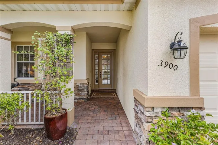 Inviting entry with seating opportunity on left side.