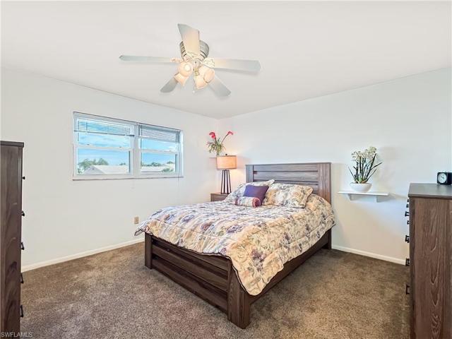Master bedroom with windows to the Lake