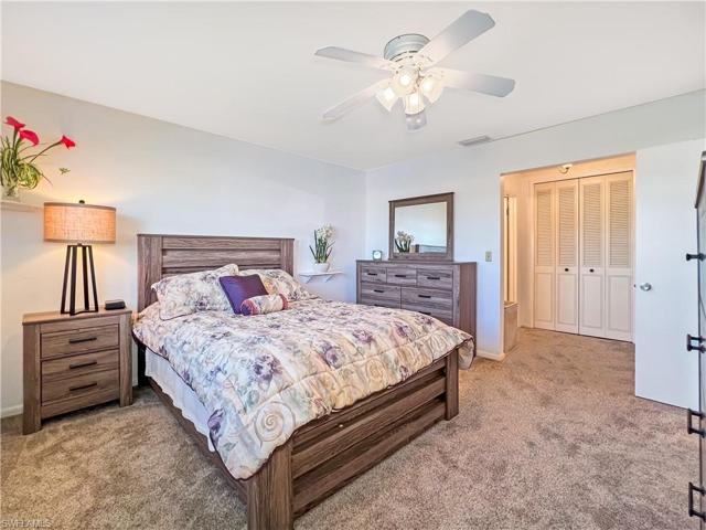 Master bedroom with walk-in closet area and on-suite bath