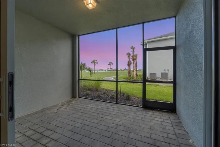 Screened patio featuring paver flooring