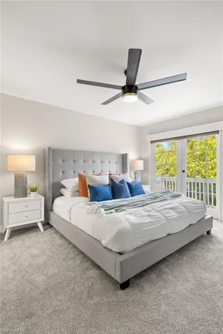 Master Bedroom featuring a king size bed and balcony.