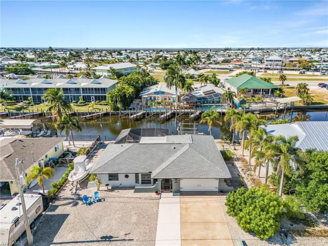 Aerial looking West toward Pine Island Sound.  Maintenance-free yard!