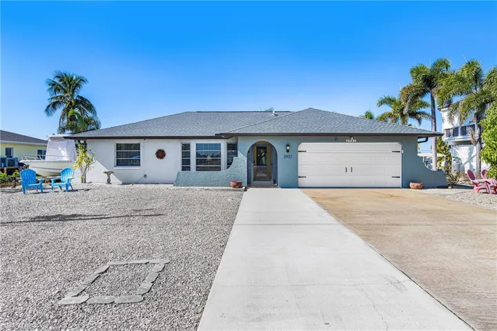 Street view of home with maintenance-free yard.