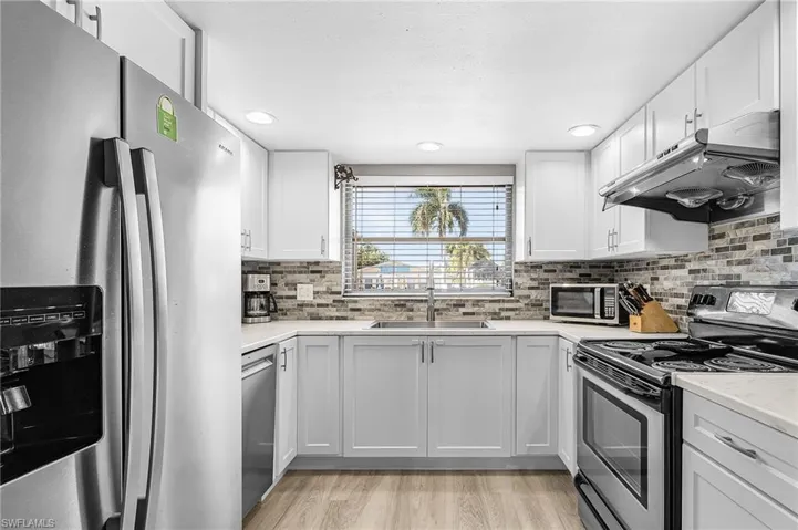 Updated kitchen with new appliances.