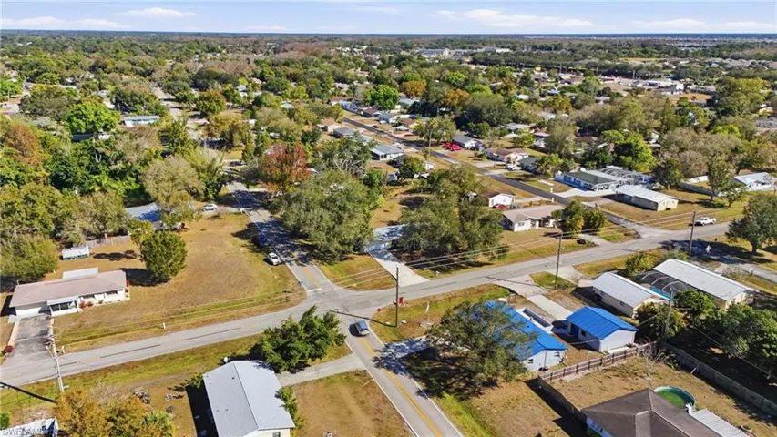Aerial overview of property's location with nearby suburban area