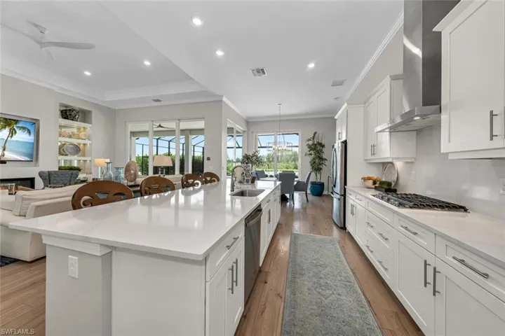 GE Profile appliances with 6-burner gas cooktop.
