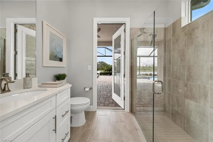 Bathroom #3 with separate door to the lanai and pool.