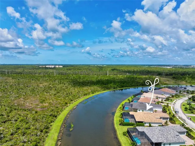 Back of home faces south overlooking canal.