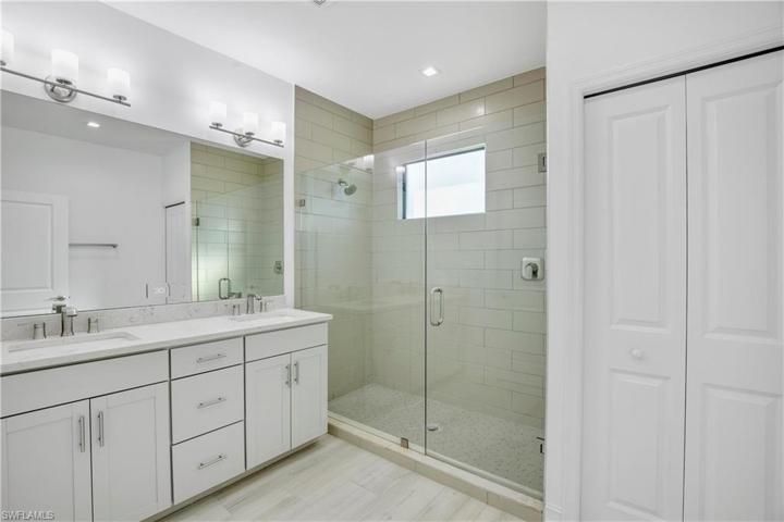 Upgraded frameless shower door