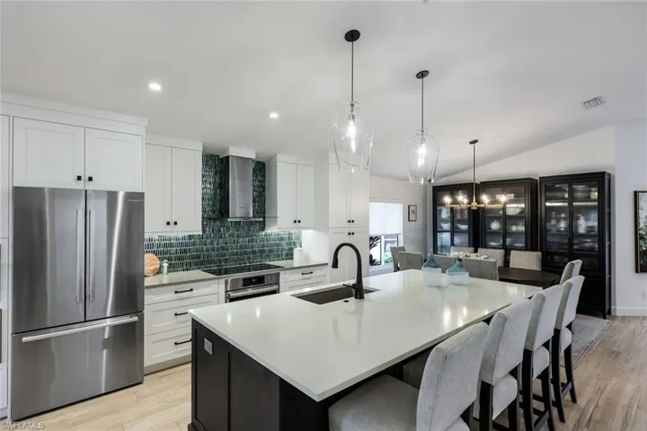 Gourmet "Chef's Kitchen" with open floor plan.