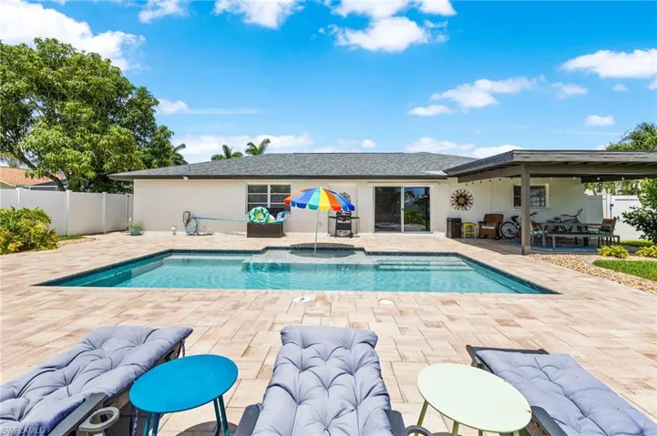 View of swimming pool with a patio area