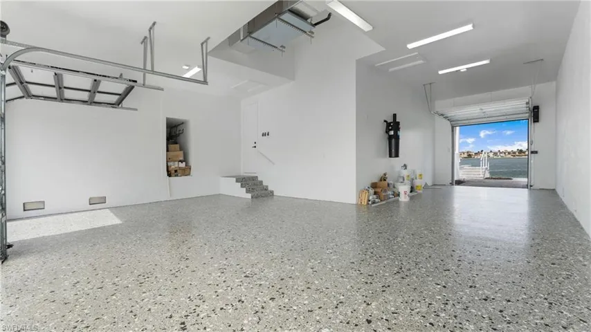 Garage with a central vacuum unit