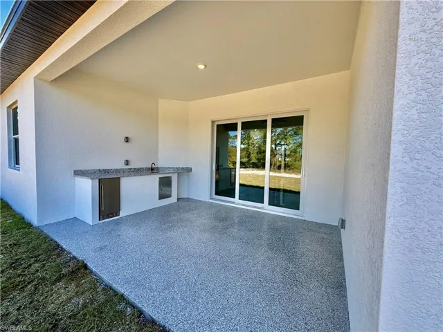 With Outdoor Kitchen