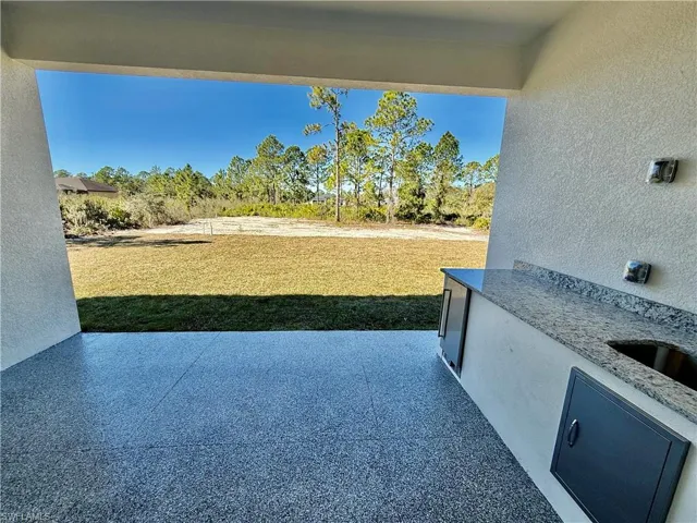 With Outdoor Kitchen