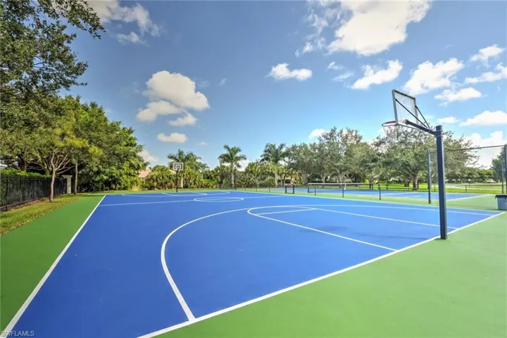 View of sport court with community basketball court and fence
