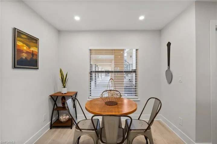 Dining area with light wood-type flooring