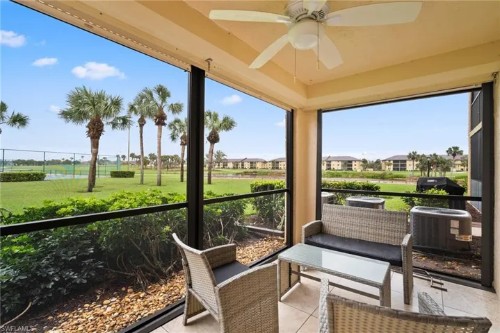 Sunroom featuring ceiling fan