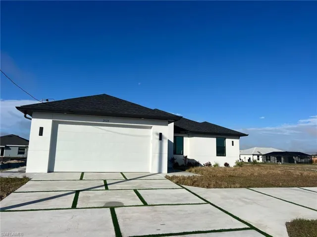 View of front of home with a garage