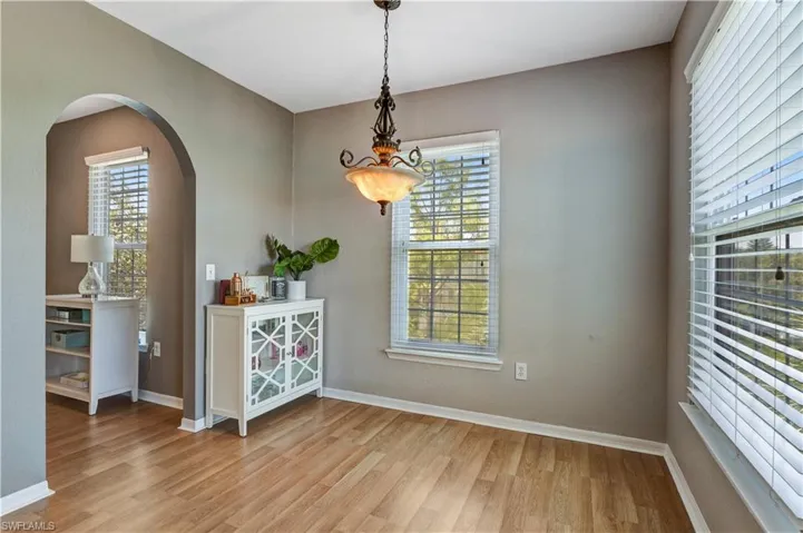 Neutral wood laminate flooring works with any color palette