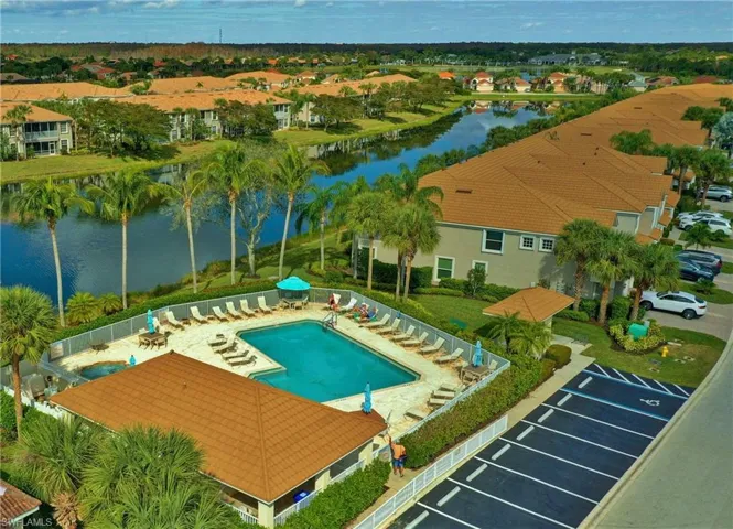 View of swimming pool featuring a water view