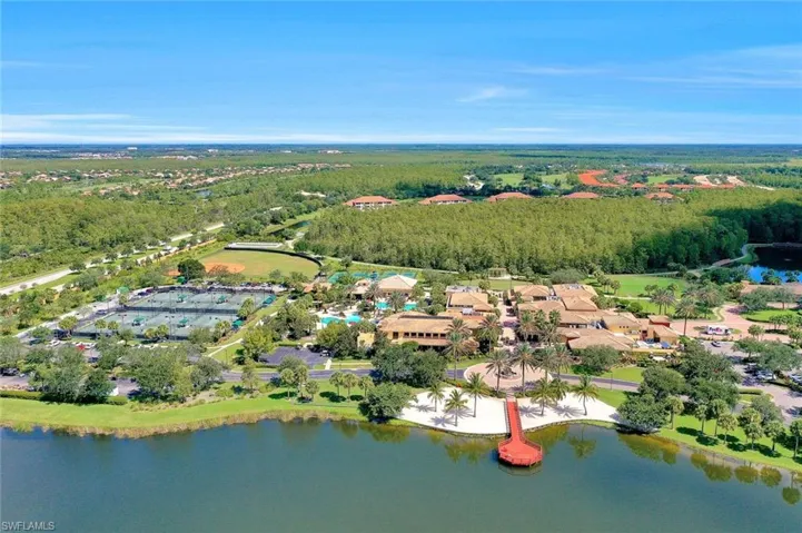 View of property location with a large body of water and nearby suburban area