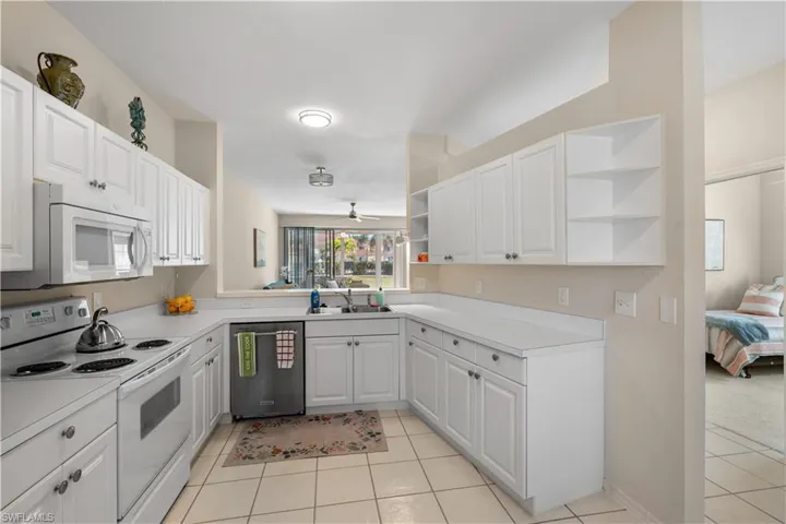White cabinetry, and open shelves